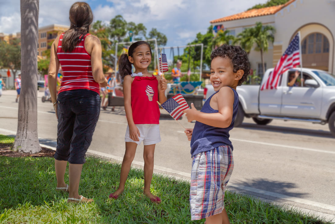 Kids watching an Independence Day parade in Florida
